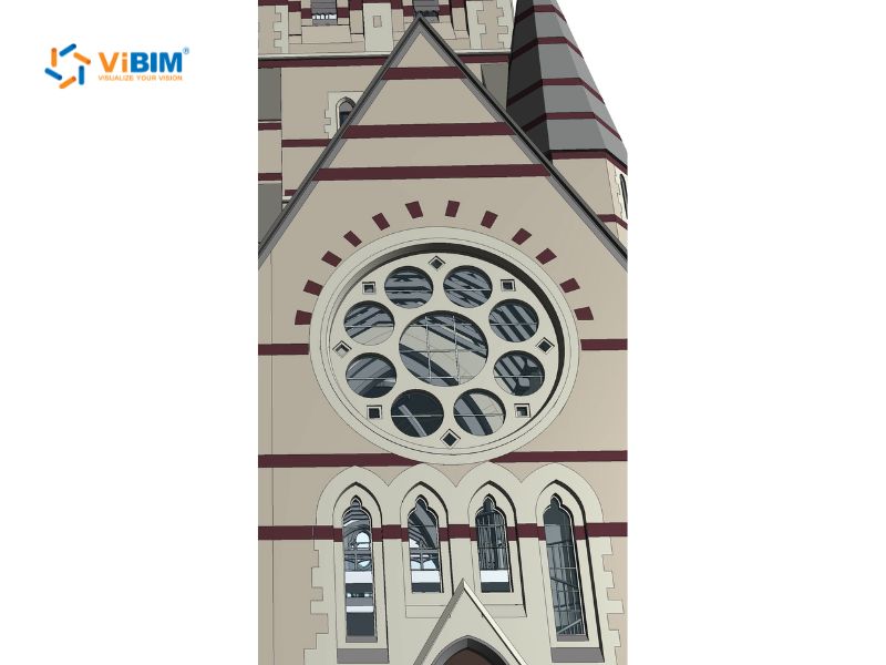 Revit Model In-Place for complex point cloud geometry: Gothic heritage church facade in the UK with rose window and decorative stonework modelled using Model In-Place families at LOD 300