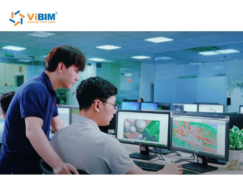 ViBIM specialists analyzing scan data on monitors, providing expert lidar point cloud to 3d model outsourcing services.