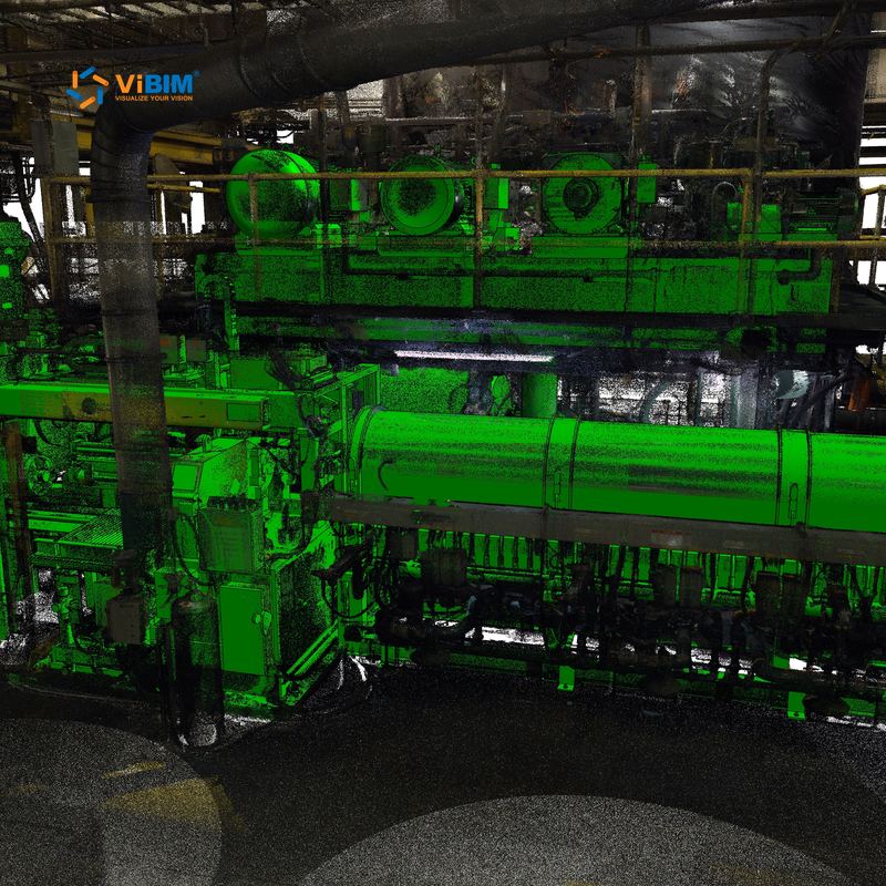 Point cloud of industrial machinery overlaid with a Revit equipment model