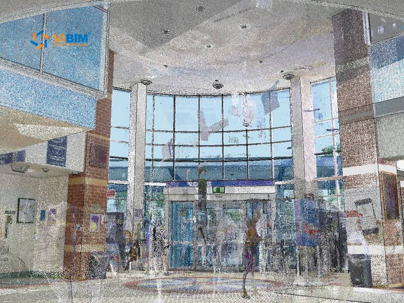 As-built BIM point cloud of a building lobby with curved glazing and entrance doors