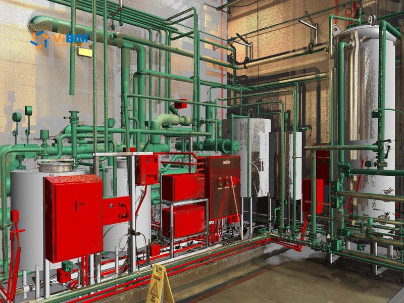 Revit fire protection piping and fire pump controllers shown over the scanned room for MEP BIM modeling